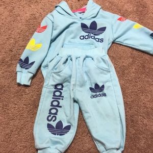 Adidas sweat outfit.